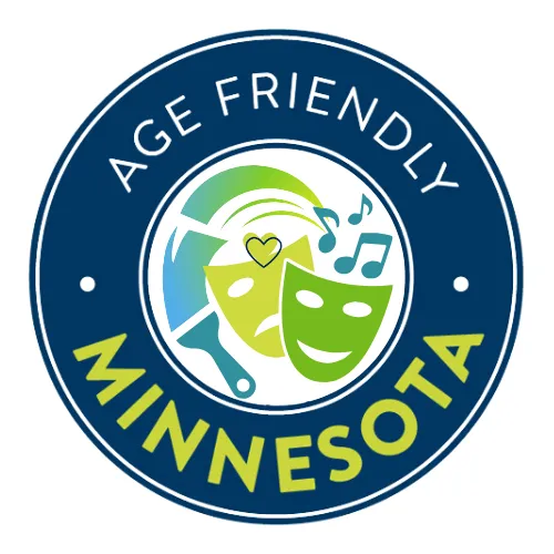 the logo of Age Friendly Minnesota. It is a circle with the name of the organization in a dark blue ring, with stylized paintbrush, comedy/tragedy masks, and musical notes in the center